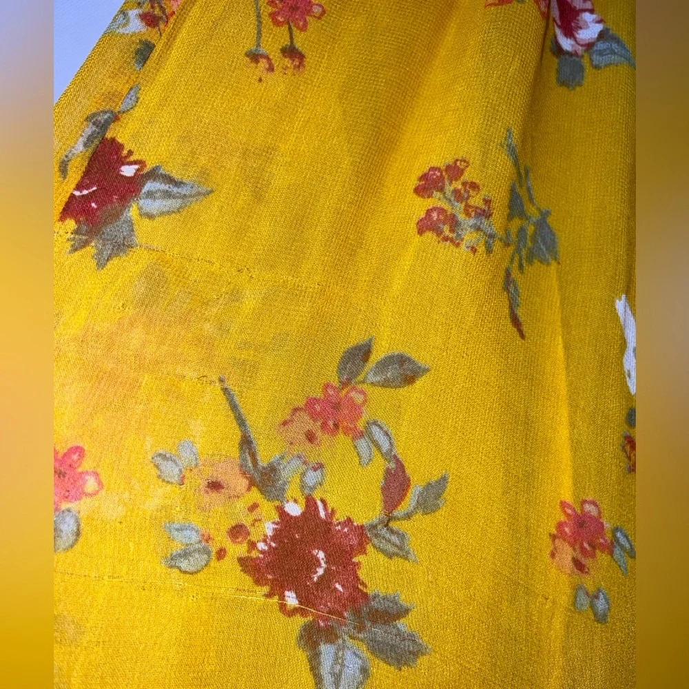 Free people - Georgia Yellow floral jumpsuit size XS( flaw)